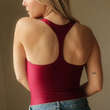 Magnolia Bodysuit Vinho. Body desportivo sustentável para mulher
